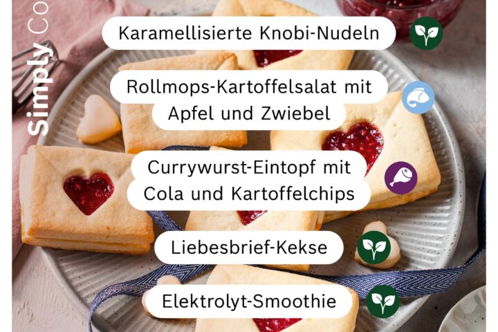 Ein Tisch mit verschiedenen Cookit‑Gerichten für Valentinstag und Karneval, darunter Nudeln, Salat, Kekse und ein Eintopf.