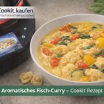 Cremiges Fisch‑Curry mit Garnelen und Kokosmilch in einer Schale serviert