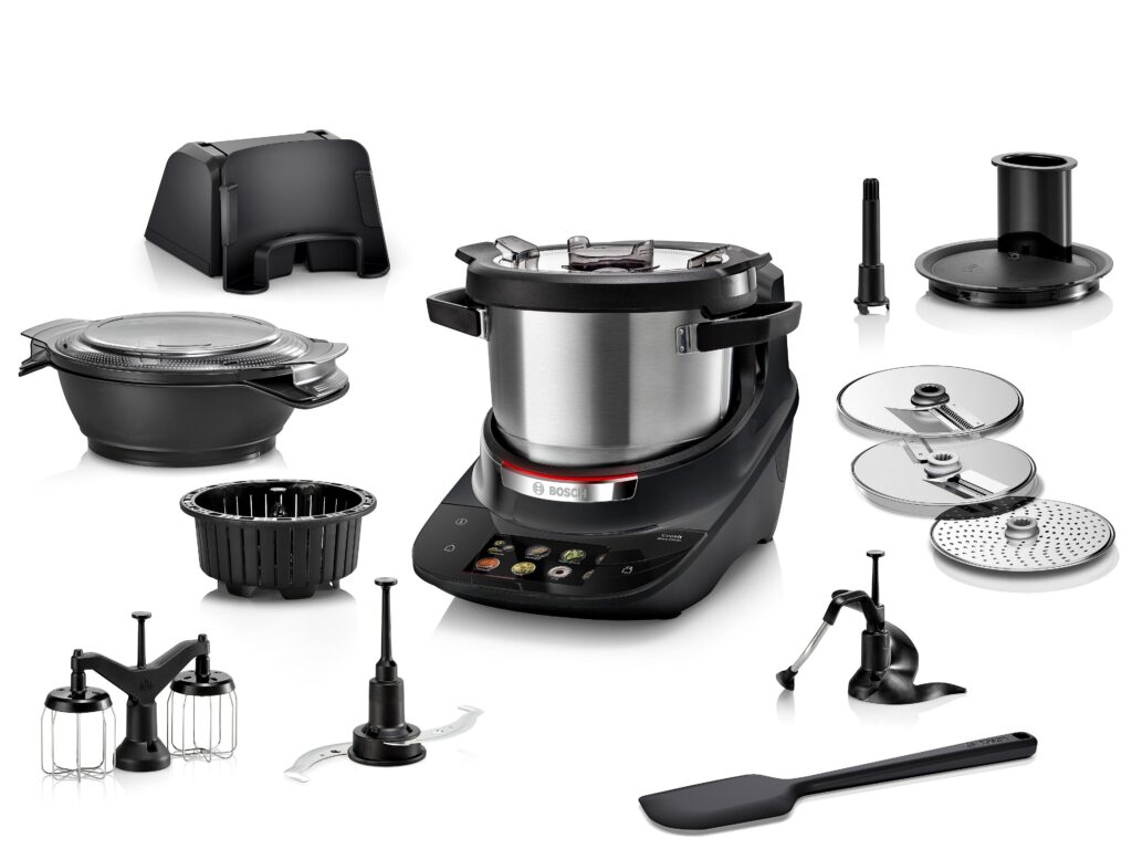Bosch Cookit Premium Schwarz mit Basis‑Zubehör, Dampfgar‑Set, Zerkleinerungsaufsatz, Schneid‑ und Raspelscheiben, Lifter und Zubehörtasche.