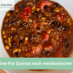 Schale mit One‑Pot Quinoa nach mexikanischer Art, gefüllt mit Bohnen, Mais, Tomaten und Kräutern – Cookit Rezept.