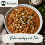 Bohneneintopf mit weißen Bohnen, Kidneybohnen, Kartoffeln, Tomaten und Feta aus dem Bosch Cookit, garniert mit frischer Petersilie.